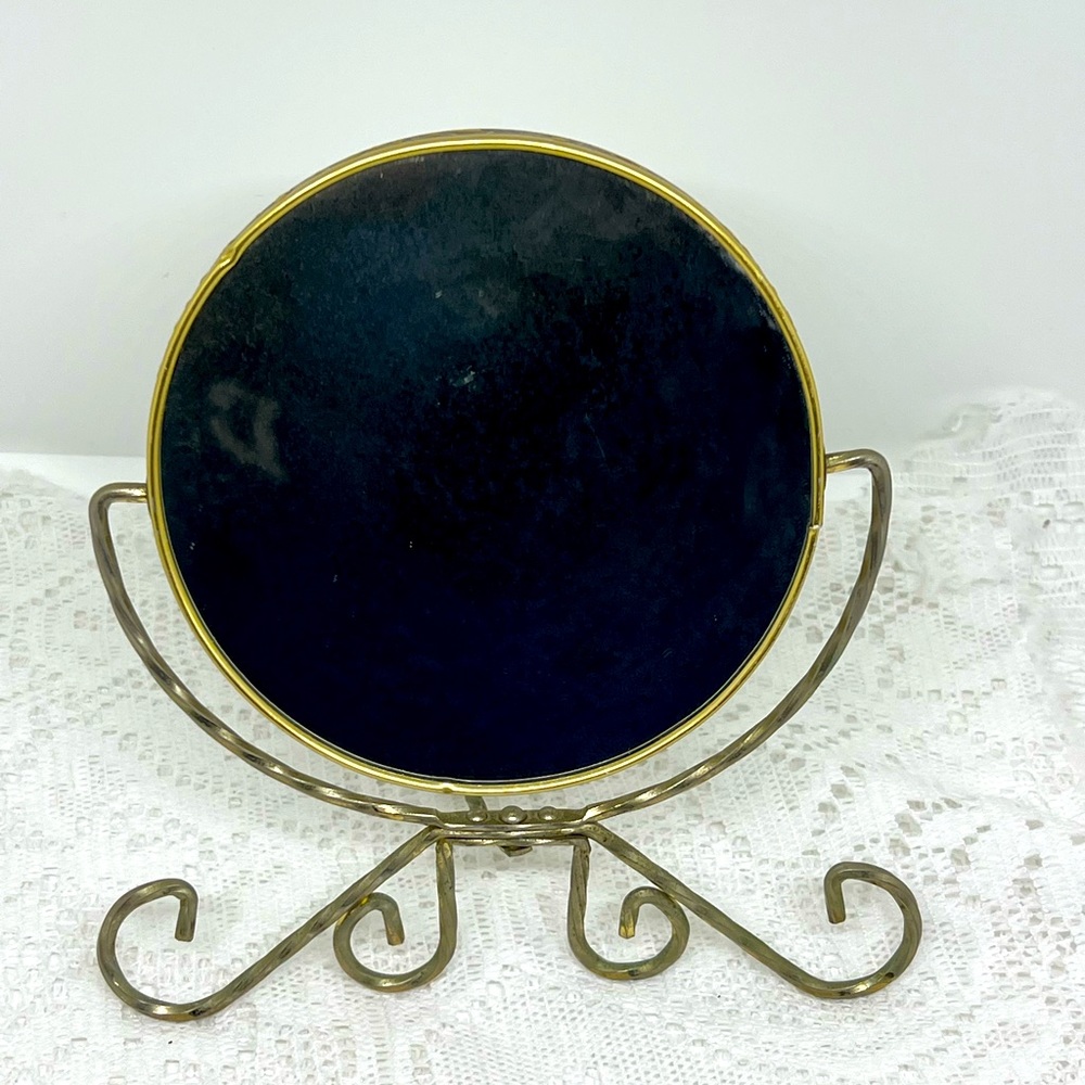 Vintage vanity mirror on brass stand